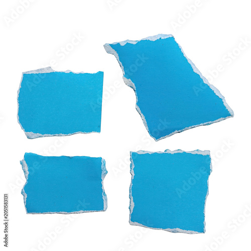 Tableau sur toile Torn paper pieces with jagged edges against a black background
