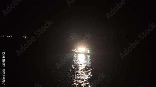 Aerial View of Illuminated Squid Fishing Boat at Night Offshore Hagi Japan, 4K Marine Industry Footage 07