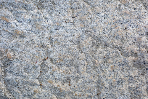 Foto Textured stone background with natural gray mineral details macro