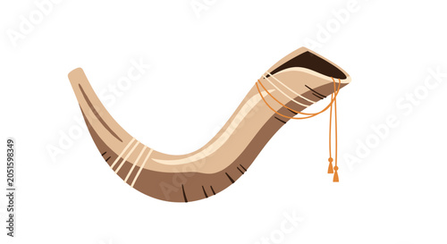 Traditional Jewish shofar instrument crafted from a ram's horn, complete with elegant decorative hanging strings.