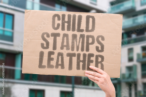 Canvastavla "Child stamps leather" Young worker in footwear production