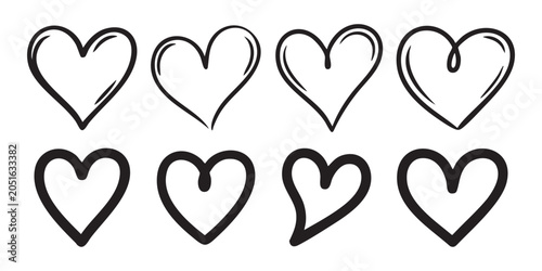 Handwritten heart icons with artistic brush strokes and doodle style on transparent background set.