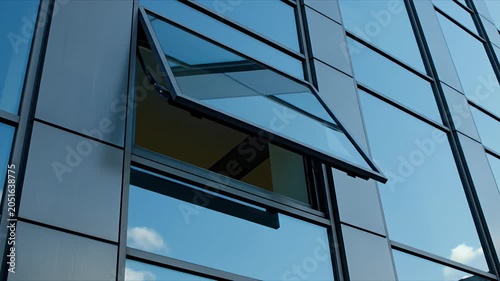 Open window on a modern glass office building.
