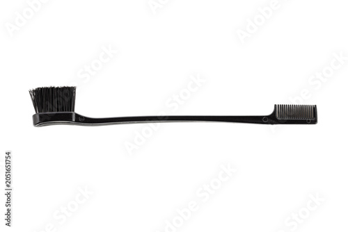 Brush with hair dyeing product isolated on white, top view