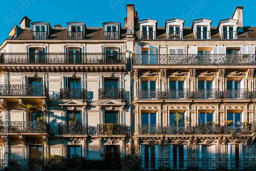Εκτύπωση καμβά Classic Paris residential building with wrought iron balconies, tall windows and