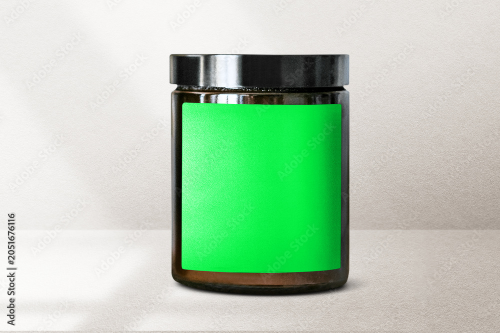 Fototapeta premium Blank jar with green label, suitable as mockup