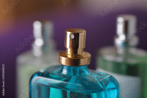 A bottle of perfume close-up.
