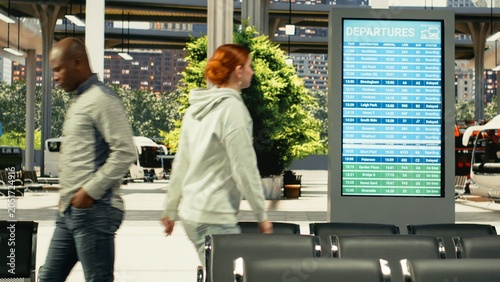 Schilderij op canvas Diverse passengers walking through bus station waiting for long-haul journey, intercity departure time, people with trolley bags and backpacks monitoring timetable, long-distance bus travel
