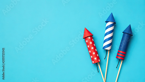 Independence day usa celebration festive fireworks rockets on blue background