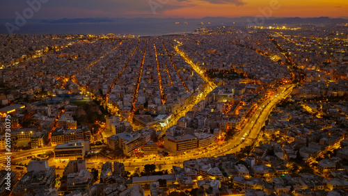 Tableau sur toile Athens skyline at twilight from an aerial view, glowing streetlights and dense u