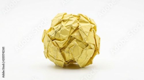 Crumpled yellow sticky note isolated on white background minimalist composition
