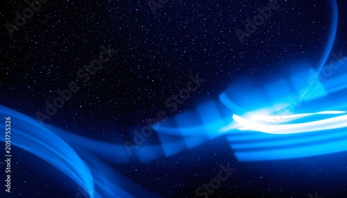 Glowing blue light streaks across a dark starry night sky with radiant beams.