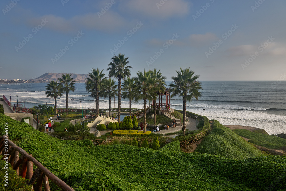 Fototapeta premium Few cities on Earth offer a skyline like this — where glass towers and ocean cliffs exist in the same breath. The sweeping panorama from the Malecón of Miraflores stretches south along Lima's entire P