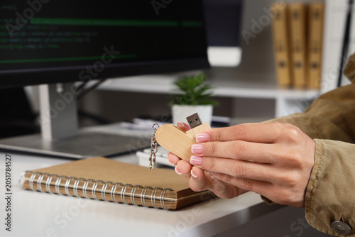 Female hands with USB flash...