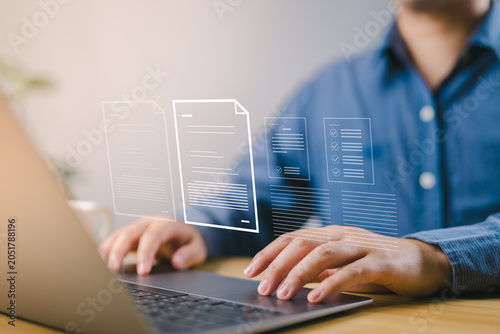 Tableau sur toile Writer typing news article on laptop, representing digital content creation, blog publishing, online storytelling, journalism, and internet media production