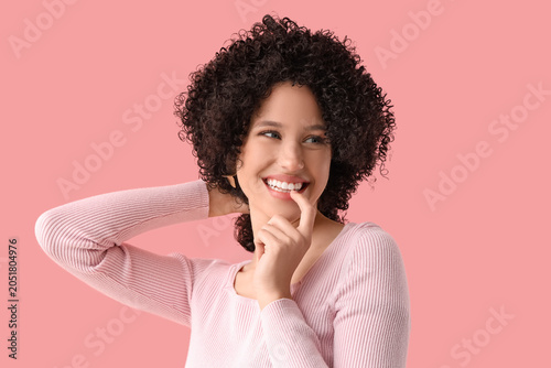 Beautiful young woman in cu...