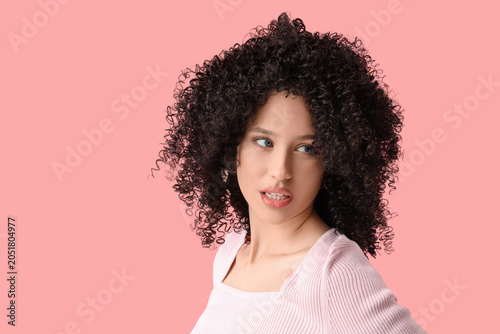 Beautiful young woman in cu...
