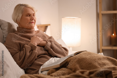 Christian senior woman with...