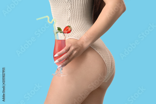 Young Asian woman in swimsu...
