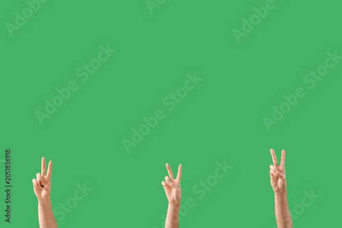 Female hands showing peace ...