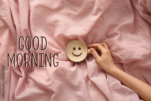 Young woman with cup of cof...