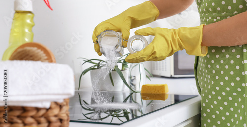 Housewife cleaning electric...