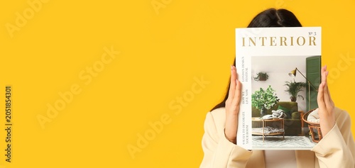 Woman holding interior desi...