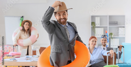 Funny businessman with hat ...