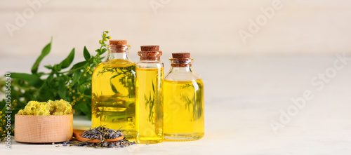 Bottles of essential oil wi...