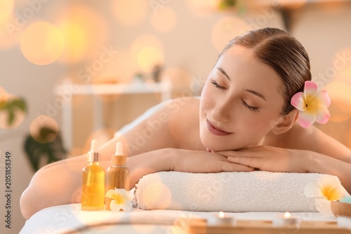 Relaxed woman enjoying spa ...