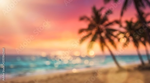 Dreamy blurred tropical beach sunset with silhouetted palm trees and sparkling ocean bokeh lights creating a serene and tranquil background