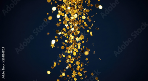 Golden confetti falling against dark background