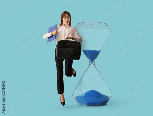 Businesswoman with briefcas...