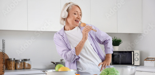 Mature woman with dancing a...