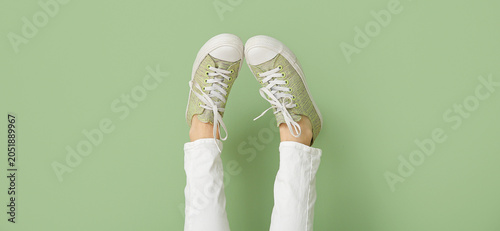 Female legs in stylish gums...