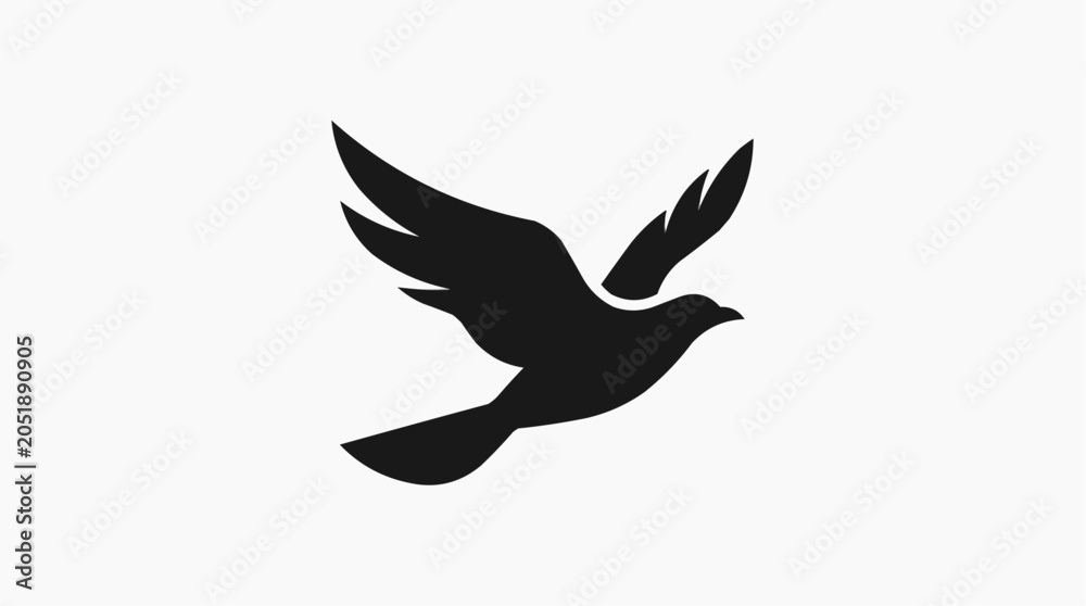 Fototapeta premium Dove Silhouette: A stark black silhouette of a dove in flight, its wings spread wide, symbolizing peace and freedom against a clean backdrop.