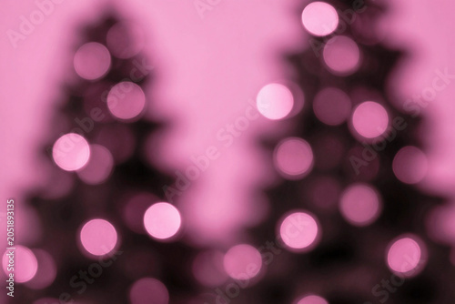 Abstract bokeh Blurred pink tone lights background. Christmas.