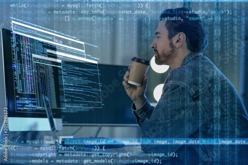 Focused male programmer dri...