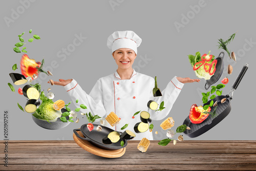 Beautiful female chef on li...