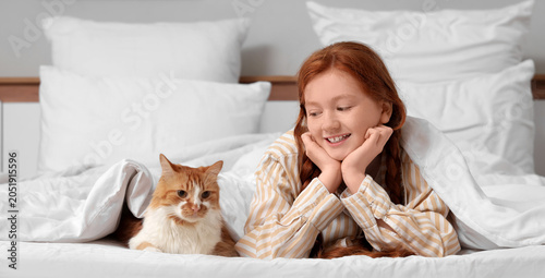 Redhead teenage girl with c...