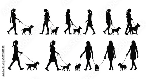 Foto Silhouettes of Women Walking Dogs on Leashes.