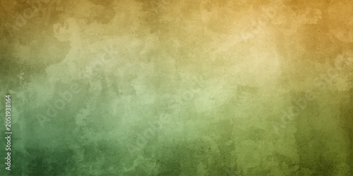 An old vintage parchment paper backdrop featuring a grunge green background textured with delicate green leaves, stains, and an antique beige pattern