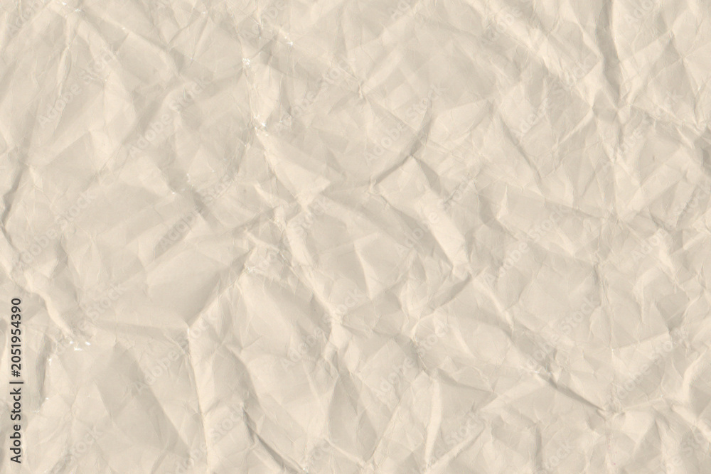 Fototapeta premium Crumpled beige paper texture background. Wrinkled blank cream off white sheet backdrop pattern for rustic vintage graphic design mockup.