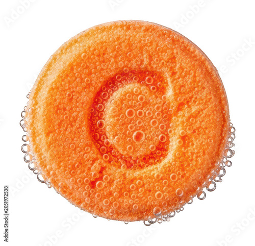 Vibrant orange Vitamin C effervescent tablet sits in refreshing bubbles isolated transparent background image