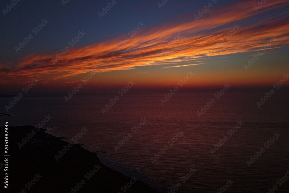 Fototapeta premium Aerial drone photo of sunset sky over the sea near Teuri Island from Yagishiri Island, Hokkaido, Japan