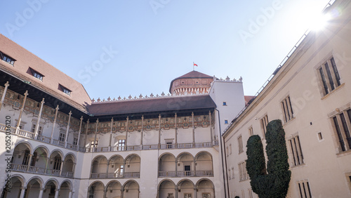 Beautiful courtyard of a historical building in the heart of the city during a sunny day. Wawel castle, Krakow, Poland.