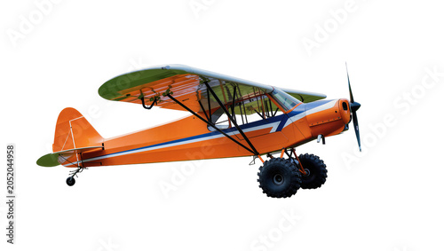 Tableau sur toile Orange high-wing bush plane with large tires, isolated on transparent background