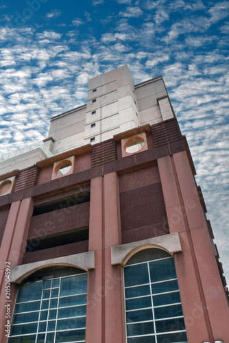 modern building with blue cloudy sky