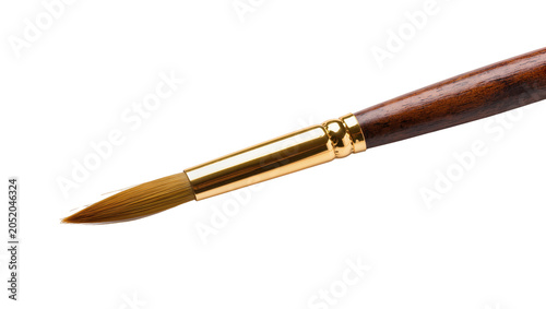 Bild auf Leinwand Detail of a pointed artist s paintbrush with wooden handle and gold ferrule, iso
