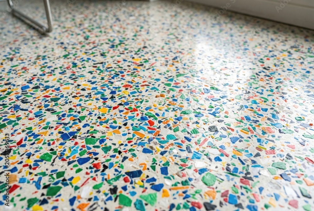 Obraz premium Detailed interior material surface featuring colorful recycled plastic chips